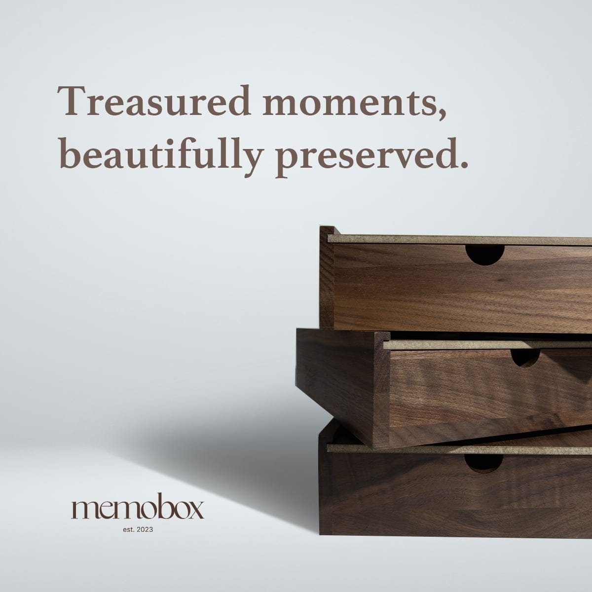 Post — treasured moments, beautifully preserved, over a stack of walnut drawers
