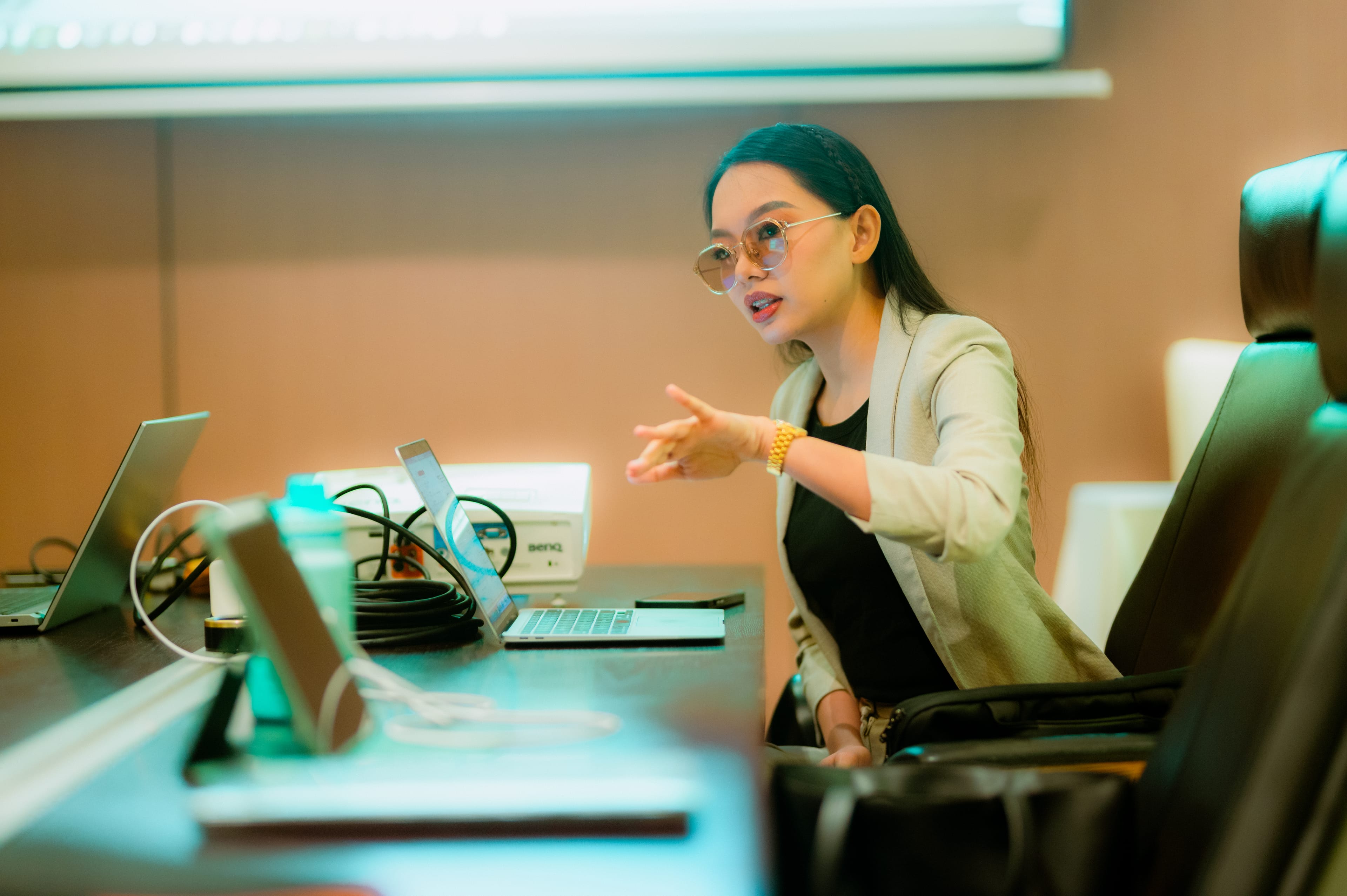 Carisle Media team member speaking at a studio table