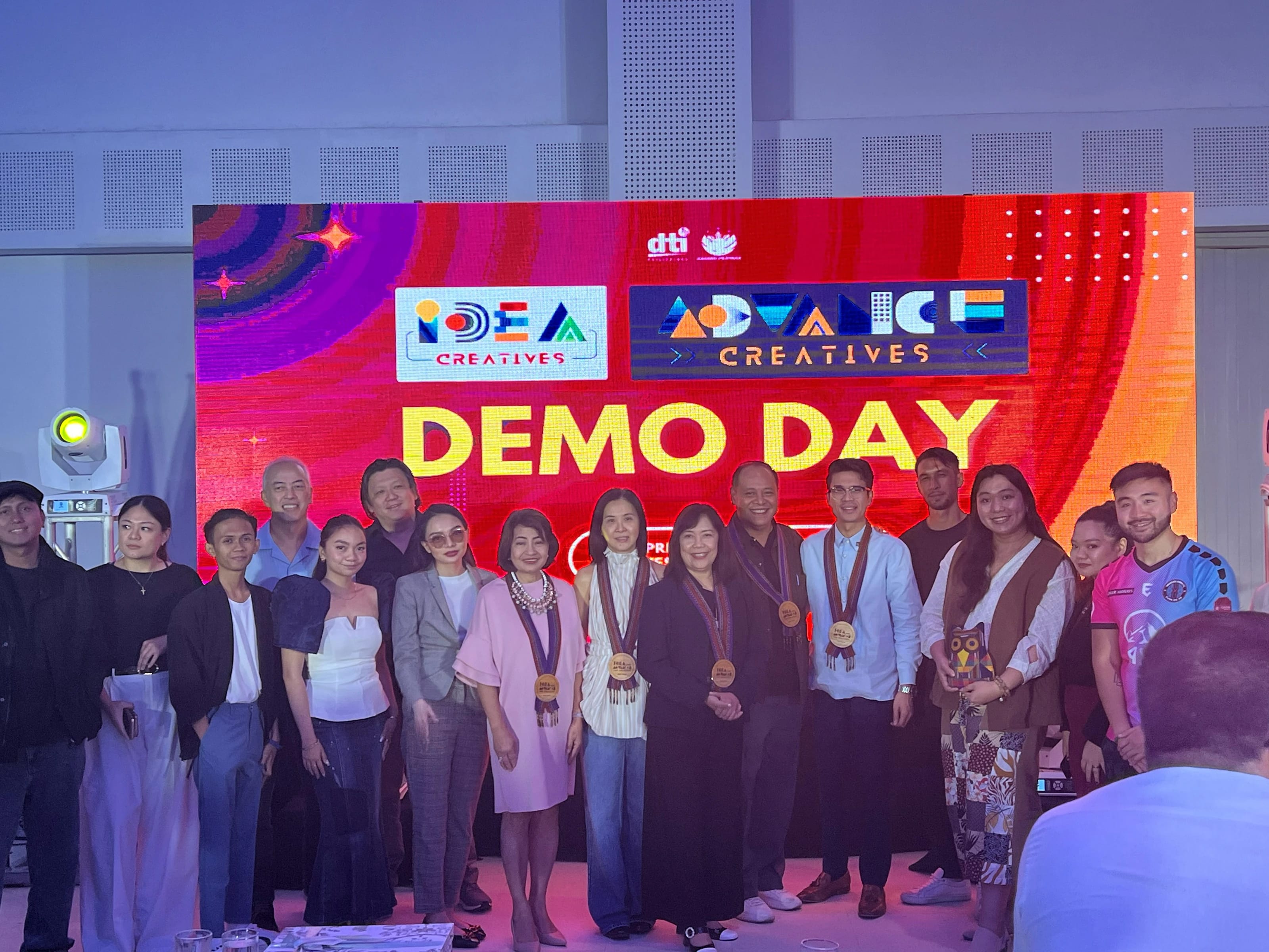 On stage with the cohort at the DTI IDEA and Advance for Creatives Demo Day